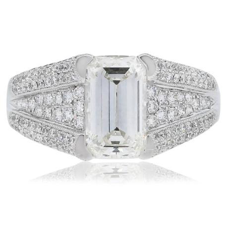 Platinum engagement ring with Emerald cut diamond and micropave band