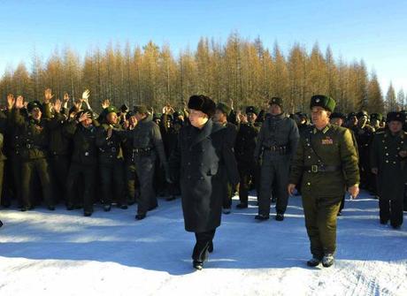 Kim Jong Un with officers and service members of KPA Air and Anti-Air Force Unit #991 (Photo: Rodong Sinmun).