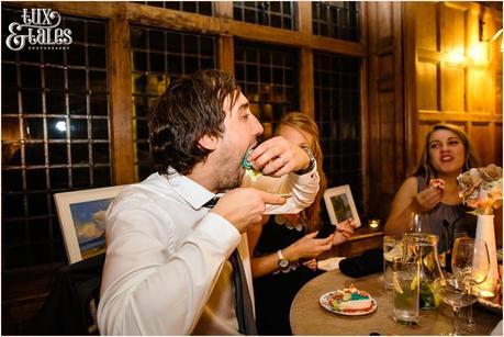 Guest eats cake silly at York wedding