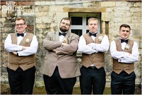 Tweed and black bow ties at Grays court wedding in York arms crossed making silly faces