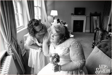 Mother kises bride at York wedding grays court