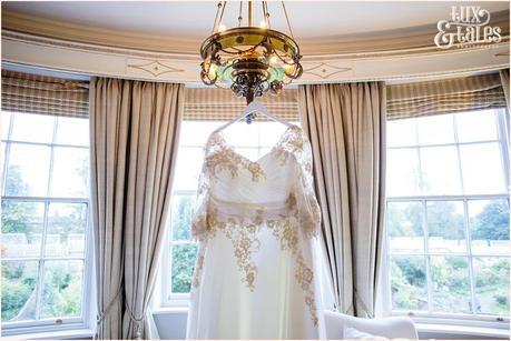 Gray's Court York Wedding White plus sized wedding dress with champaign details