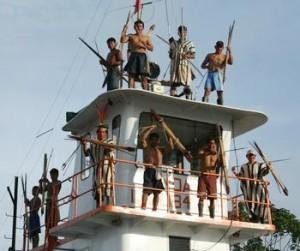 Peru’s extractive policies have been a major source of social conflict in the last few years. In this photo from May 2009, Ashanika warriors occupy oil boat in the Peruvian Amazon.