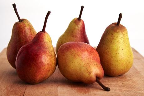 Pears on wood board
