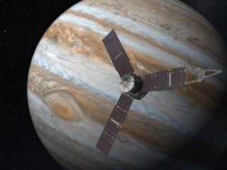 Artist rendering of the Juno satellite orbiting Jupiter.