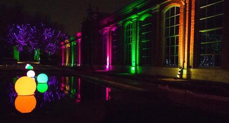 Photo of The Linnean House at the Missouri Botanical Garden with colored lights. 