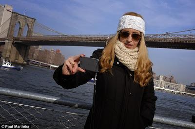 sickening Selfie .. woman takes photo of self in front of Brooklyn bridge