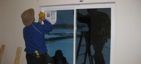 Installation of a triple-pane window in one of PNNL’s Lab Homes.