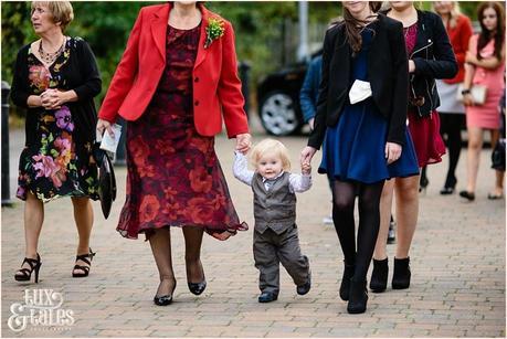 Autumn thtmed wedding little boy walked to mom wearing suit