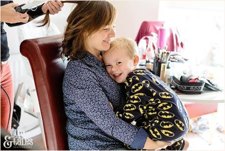 Bridesmaid hugs son at Hull wedding