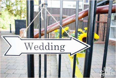 Sign pointing to wedding