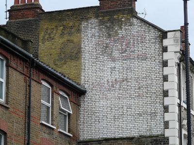 Whitby's of Acton – a ghostsign for the garage