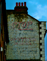 Whitby's of Acton – a ghostsign for the garage