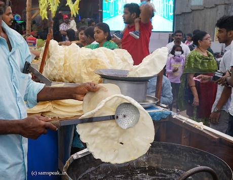 frying deep in oil - the tasty, crunchy Appalam !!