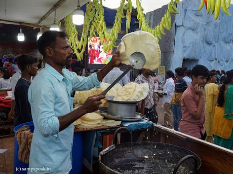frying deep in oil - the tasty, crunchy Appalam !!