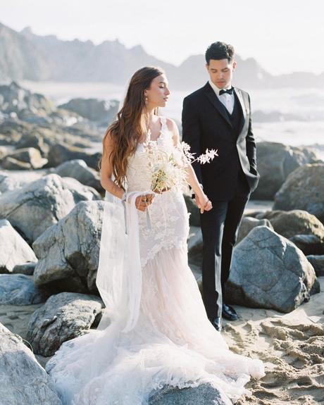 beach wedding bride and groom in black white outfits