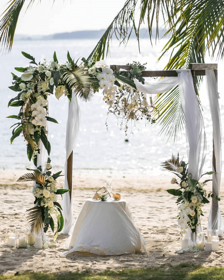 beach wedding ceremony arch with flowers