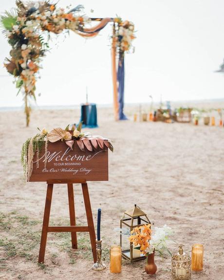 beach wedding diy idea for decor with candles and welcome board