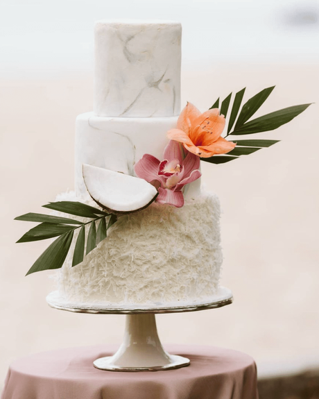 tropical wedding cakes three layers with coconut and flowers