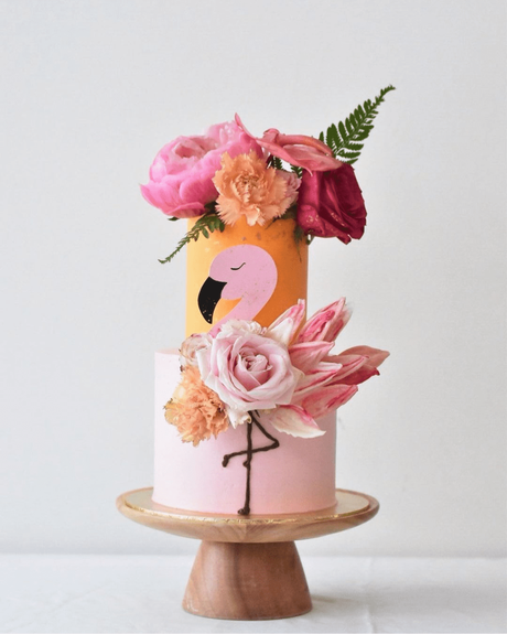 tropical wedding cakes pink and orange with flamingo decor