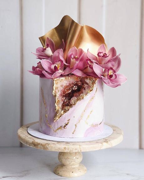 tropical wedding cakes pink with gold touches