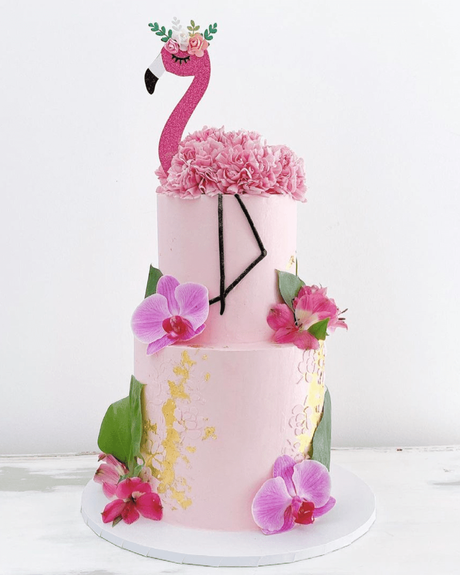 tropical wedding cakes two layers with flamingo decor