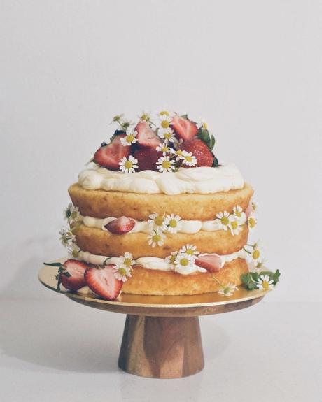 naked wedding cakes with fillings and berries decor