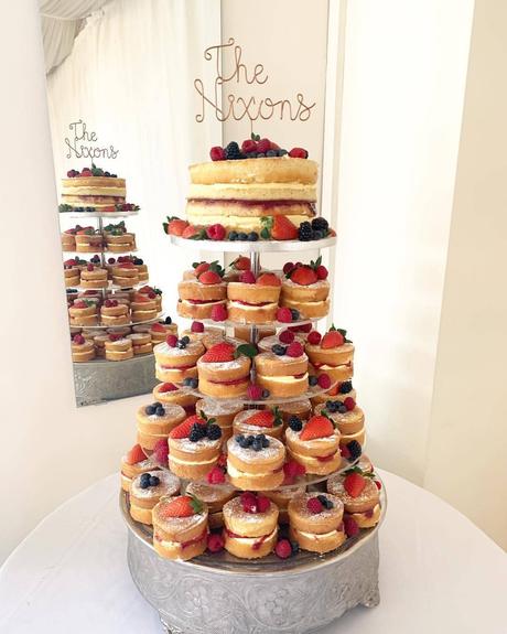 naked wedding cakes and cupcakes with berries