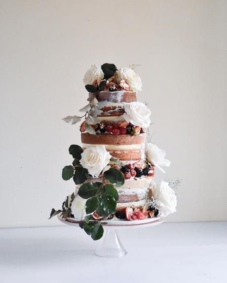 naked wedding cakes 4 tier with floral decor