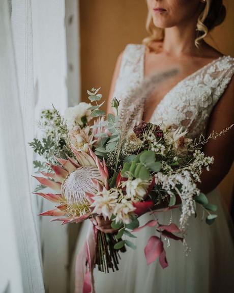 popular wedding flowers rosy protea bouquet ideas