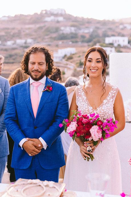 Modern summer wedding in Sifnos with bougainvillea in fuchsia hues │ Demetra & Panayiotis modern-summer-wedding-sifnos-bougainvillea-fuchsia-hues_34