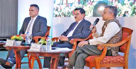 Indian High Commissioner Gopal Baglay, State Minister of Finance Shehan Semasinghe and  Governor Dr. P. Nandalal Weerasinghe at the event