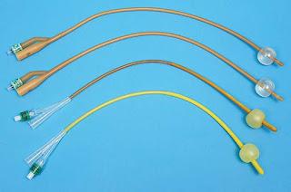 A Flexible Tube Known As An Indwelling Catheter Is Used In Urology To Drain Urine. A Doctor Inserts It Via The Urethra And Into The Bladder A Flexible Tube Known As An Indwelling Catheter Is Used In Urology To Drain Urine. A Doctor Inserts It Via The Urethra And Into The Bladder