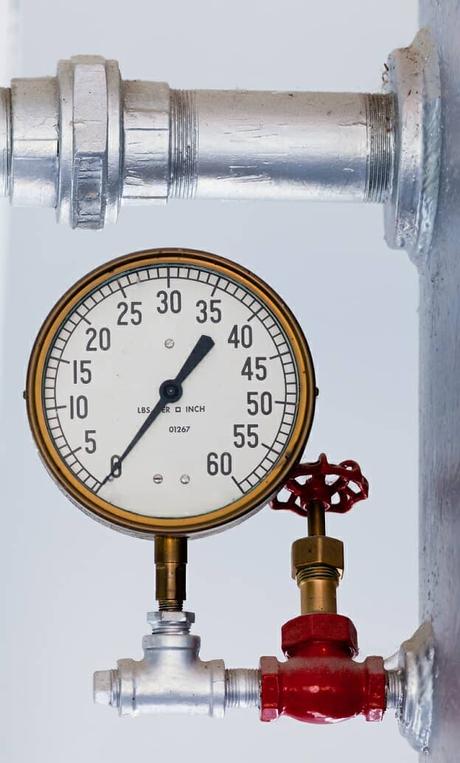Metal pressure gauge on boiler tank