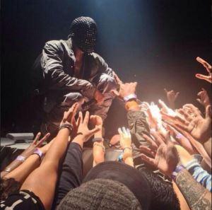 Kanye-engages-with-the-crowd-on-the-Yeezus-tour