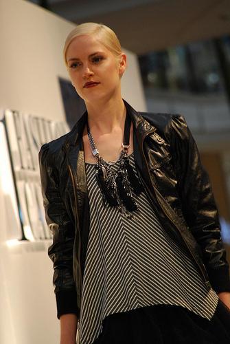 Black leather jacket, diagonal striped blouse - Morrison