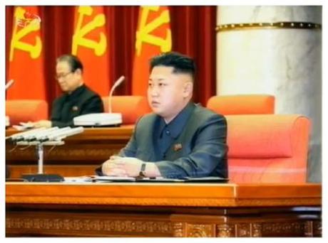 Kim Jong Un attends an expanded KWP Political Bureau meeting in Pyongyang on 8 December 2013.  Also seen in attendance is Kim Yong Il (L), KWP Secretary and Director of the International Affairs Department (Photo: KCTV screen grab).