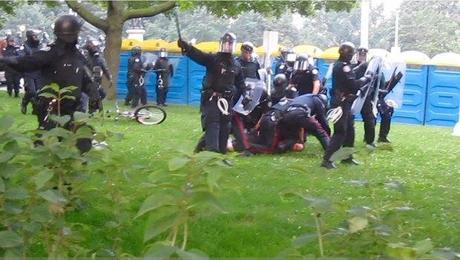 Adam Nobody being detained during the G20 conference in Toronto, Ont. in June of 2010. Handout video framegrab / Falconer Charney LLP
