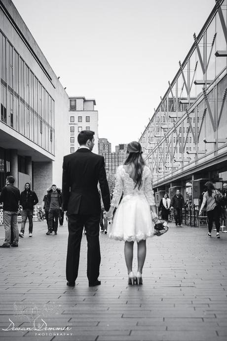 Wedding couple on the crowded avenue