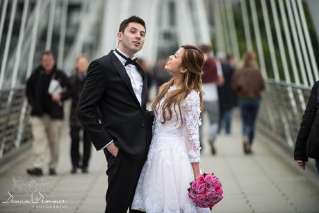 Wedding Couple share a moment on Hungerford Bridge