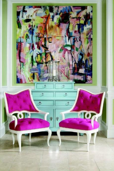 |Residential  interiors that are inspiring with its color scheme|pink armchairs are the perfect colors against the abstract multi-colored painting 