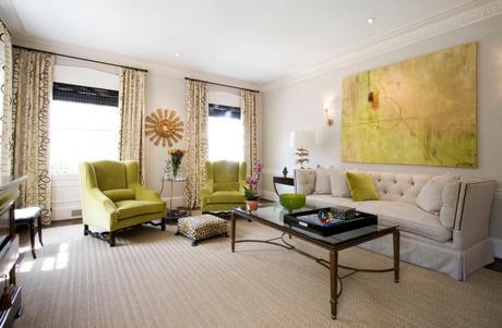 all white room with lime and yellow art and gold