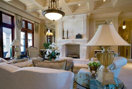 beautiful mantel and architexture in a large neutral living room