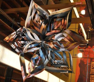 A recycled snowflake holiday decoration.  Only Whole Foods would think up something this clever!