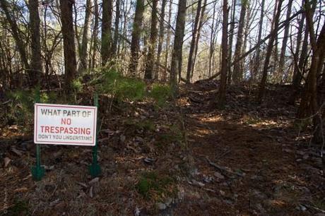 This sign is on the east side of hwy 157. The landowner is, apparently, a little bit snarky. The faint trail that you can see to the right is assuredly on the Zahnd tract and is completely public (it leads to an overlook).