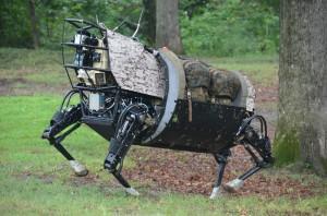 This is LS3 (Legged Squad Support System meant to serve as a semi-autonomous pack animal for hauling human soldiers gear through rough terrain. 