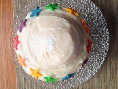 rainbow birthday cake simple decorations white vanilla buttercream and fondant coloured stars
