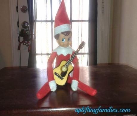 Rascal Elf on the Shelf Playing Guitar