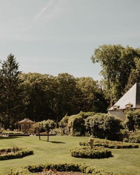 best wedding venues in michigan park with trimmed trees and shrubs