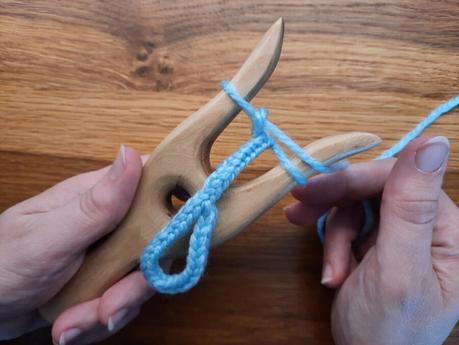 Lucet tips: how to make a loop Making a loop with the lucet, step 4: finish your braid, while hiding the tail inside the new stitches